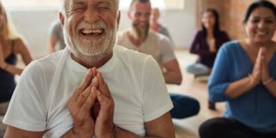 A group of people meditating.
