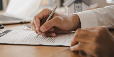 A man checking paperwork.