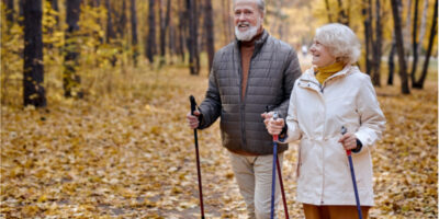 Two people hiking in the woods.